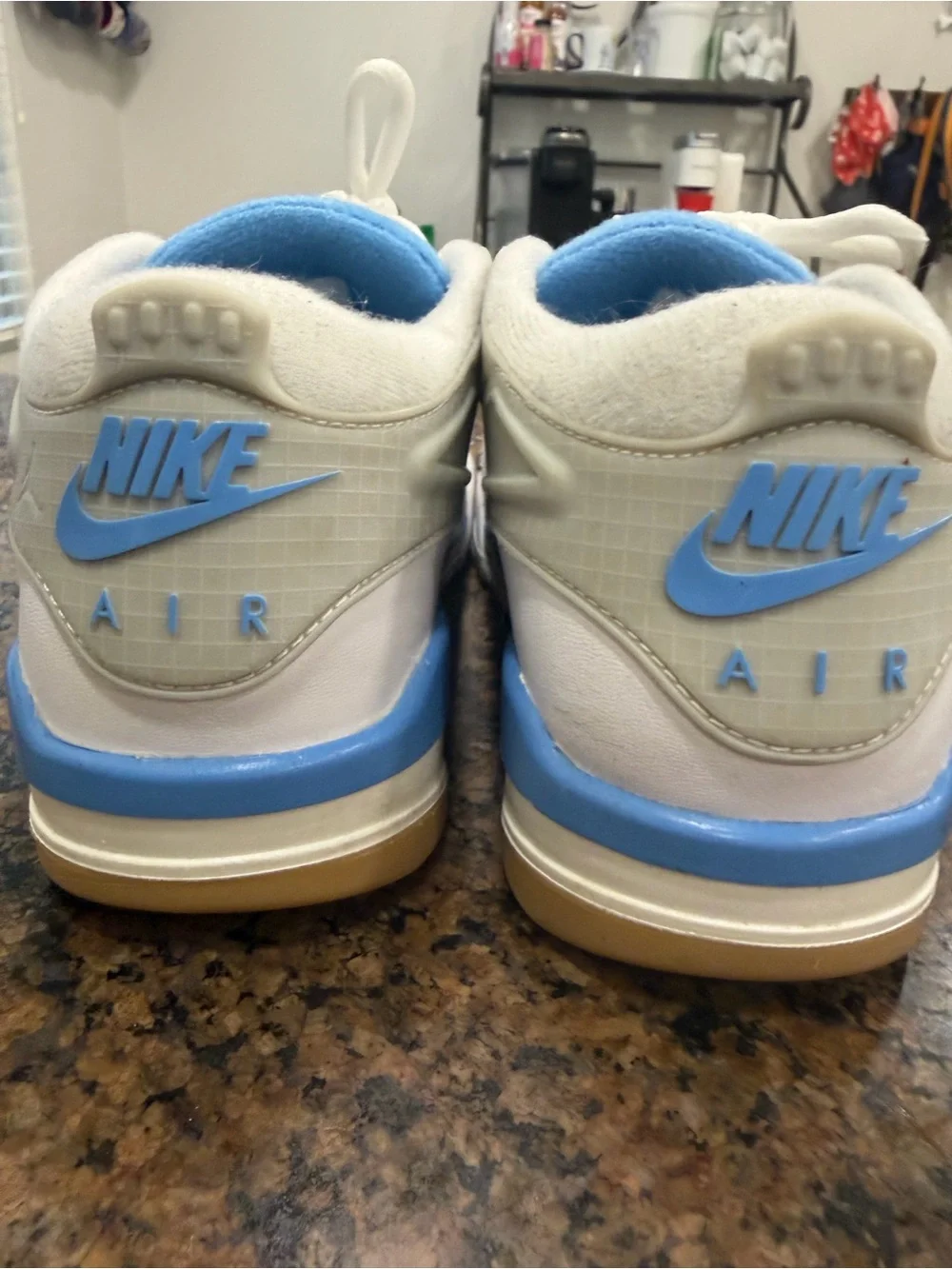 Nike Men's White Gray Sneakers with Blue Collar Accent